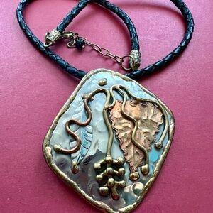 Necklace/hammered pendant,mixed metal brass, copper, sterling silver/20” leather